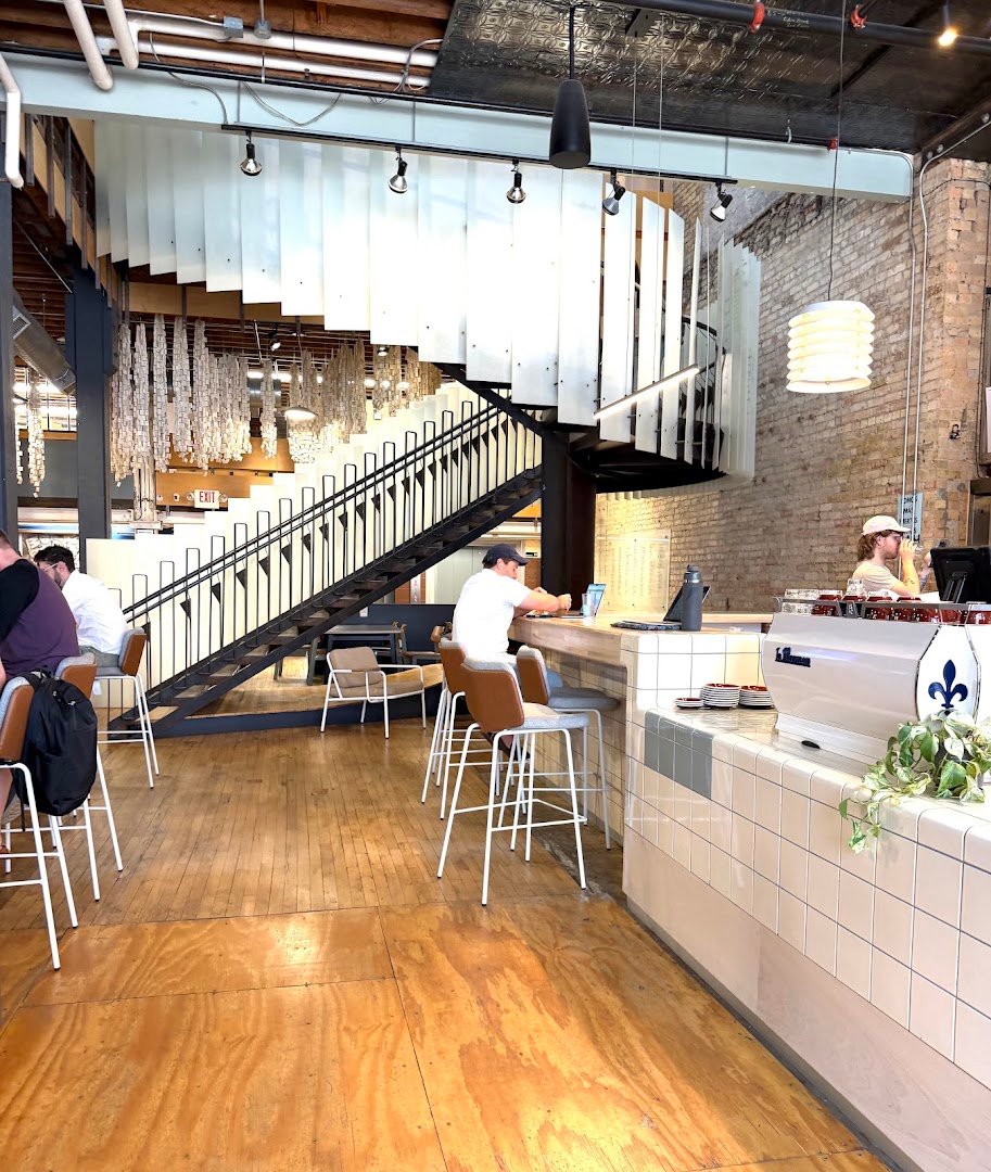 Interior of FRGMNT Coffee - Mill District, specialty coffee shop in Minneapolis